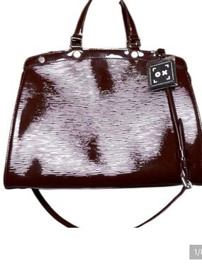 Louis Vuitton Pont-Neuf PM in glossy Amarante Epi Electric leather